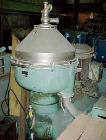 Used Alfa Laval SPQX-512S-31CG-60 Nozzle Centrifuge. 60 HP motor 3/60/460, belt driven, upper piping, base and sub-base. Maximum speed is 4630 rpm, recycle feature, suitable for up to 25,000 lb/hour ...