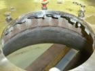 USED: Dorr Oliver Merco BH-36 nozzle disc centrifuge. Ferralium 225 rotor assembly, bronze housing. Driven by a 150 hp, 3/60/460 volt, 1760 rpm motor, 2600 rpm bowl speed. Includes control panel, bas...