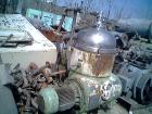 Used Westfalia nozzle centrifuge, type RTA140-51-076. Material of construction is 316 stainless steel. Max bowl speed 5000 rpm by an approximate 27.75 hp/18.5 kw-380 volt/50 cycle/3 ph XP flanged dri...