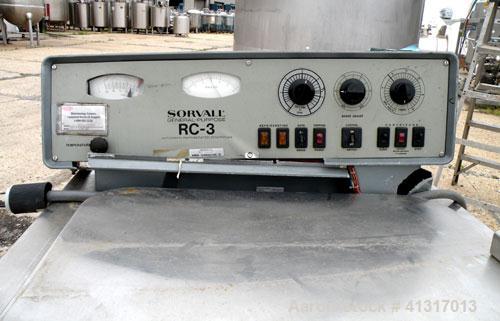 Used Sorvall RC-3 Refrigerated Floor Centrifuge. Approximate speeds to 5250 rpm, forces to 7,120 g. Model HG-4L swinging bucket rotor with (4) 4" diameter x 5 1/2" deep buckets. Top door.