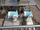 Used CINC Industries V0-2 Centrifuge, 316L Stainless Steel Construction. Rated 0.5 gallons per minute at 30 psi at 220 degrees F., 6000 rpm maximum bowl speed, 0.125hp, 230/460 volt motor drive on st...