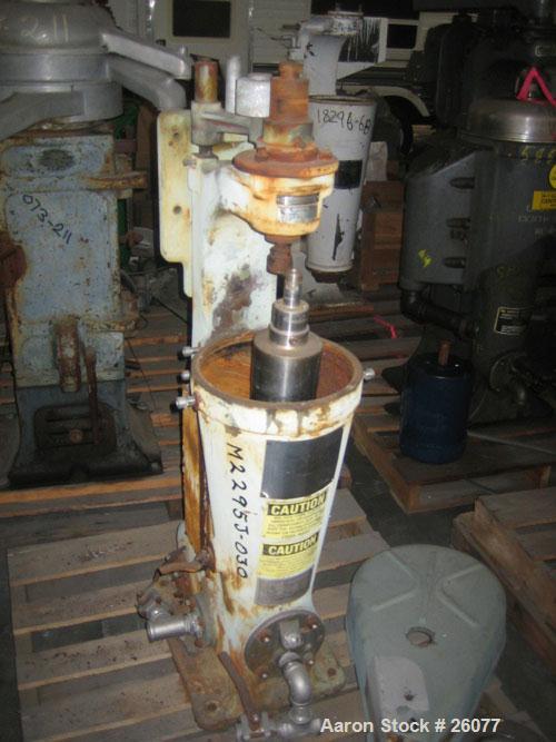 Used Sharples AS14V Super Centrifuge. 316 stainless steel bowl and covers. Maximum bowl speed 15,000 rpm. Front drag assembly. Requires motor