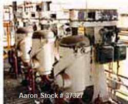 USED: Sharples AP-26 Super centrifuge, CS. Max bowl speed 15,000 rpm,pressuretite separator design w/deep sludge cover, 5 hp XP motor 220/440/3/60, belt guard & XP controls. Prior use=cottonseed oil ...