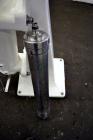 Used Sharples AS-16 Super Centrifuge. 316 stainless steel construction (product contact areas), clarifier design (liquid/solids separation), lower drag assembly, top cover (missing discharge covers),...