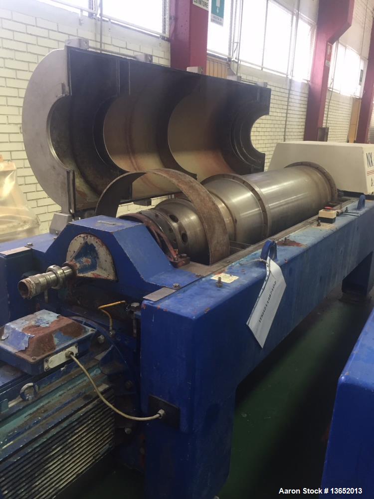 Used Alfa Laval NX-928 Solid Bowl Tricanter Centrifuge. 316 Stainless steel construction (product contact areas). Maximum bowl speed 3250 rpm, Single row of lined cake discharge ports, single lead co...