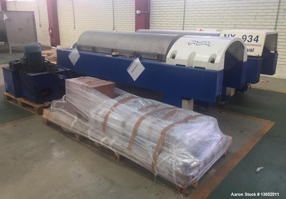 Used Alfa Laval NX-934B-11G Solid Bowl Tricanter Centrifuge. 316 Stainless steel construction (product contact areas). Maximum bowl speed 3250 rpm. Single row of lined cake discharge ports, single le...