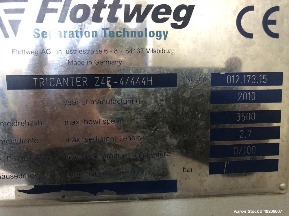 Used Flottweg Z4E-4/444H Tricanter Solid Bowl Decanter Centrifuge. Maximum bowl speed 3500 rpm, three phase separation (liquid/liquid/solids separation), bowl, conveyor, base, casing, feed pipe, grea...