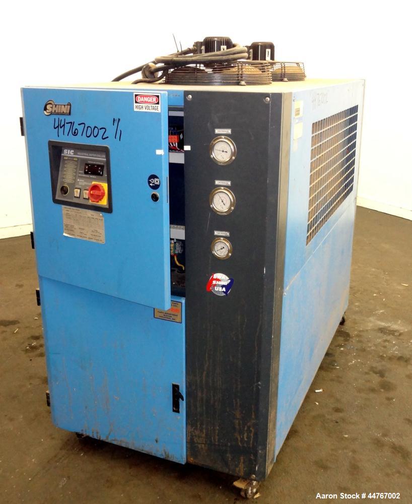 Used Shini Budzar SIC Series Air-Cooled Chiller, 10 Tons, Model BWA-AC-10-FCB-22-0-000. Flow rate 24 gallons per minute, temperature range 45 to 70 degrees F, 150-450 psi, 16 pound charge or R-407C r...