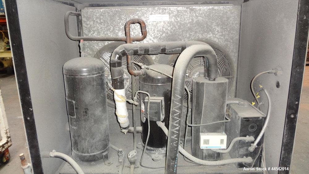 Used Conair MicroKool Chiller, Model MPA-7.5, Approximately 6.9 tons. Air cooled. Temperature range 20 to 65 degrees F. Includes PC-1 Microprocessor control panel. Mounted on casters.