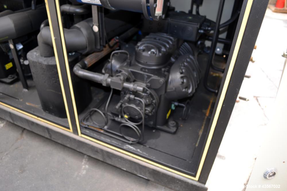 Used Lauda 56kW Secondary Circle Unit Cooler, Type SUK400WII. Temperature range -50 to 200 degrees C. (-58 to 392 F.). 3/50/400 volt. Mounted on casters. Built 2002.