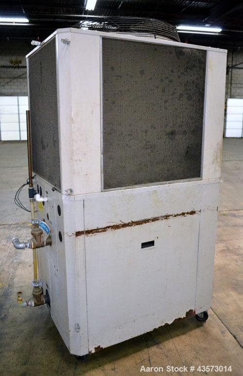 Used AEC Model PSA-7.5 Air Cooled Portable Chiller. Cooling capacity 6.6 tons. Temperature range 30-65 degrees F. 11-1/2 Pound charge of R-22 refrigerant. Has a 20 gallon polyethylene reservior. Has ...