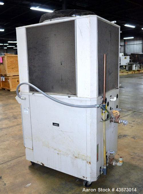 Used AEC Model PSA-7.5 Air Cooled Portable Chiller. Cooling capacity 6.6 tons. Temperature range 30-65 degrees F. 11-1/2 Pound charge of R-22 refrigerant. Has a 20 gallon polyethylene reservior. Has ...