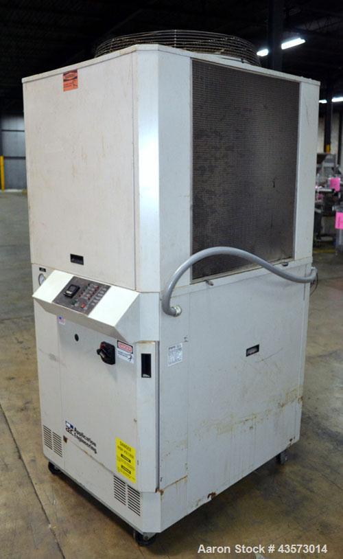 Used AEC Model PSA-7.5 Air Cooled Portable Chiller. Cooling capacity 6.6 tons. Temperature range 30-65 degrees F. 11-1/2 Pound charge of R-22 refrigerant. Has a 20 gallon polyethylene reservior. Has ...