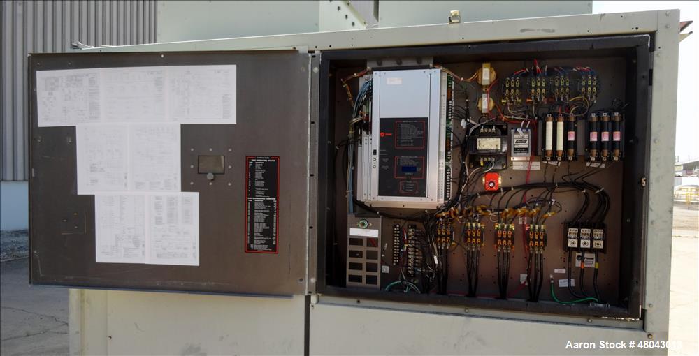 Used Trane IntelliPak Air-Cooled Chiller, 50 Tons, Model #CGAEC504ABA1WHR. R-22 Coolant. Design pressure 450 psi. 40 to 50 Degrees F without ice machine. (4) Compressor motors, (6) condenser fan moto...