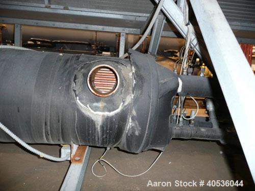 Used Trane 100 Nominal Ton Air Cooled Screw Chiller. Trane model RTAA1004YH01A3DOF. Designed for 460/3/60 volt operation. Year 1997.