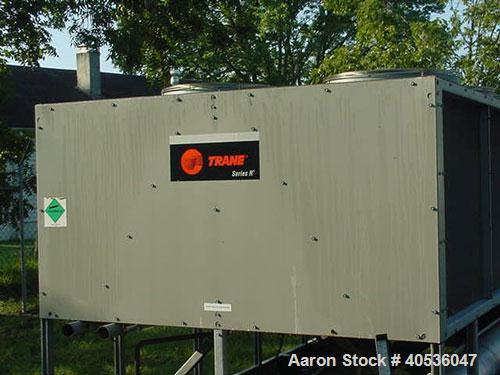 Used 125 Nominal ton Trane chiller, model RTAA125RTAA125AA125AYN01A0300BN. Air cooled screw chiller designed for 200/3/60 volt operation. Includes existing charge only of refrigerant. Also includes a...