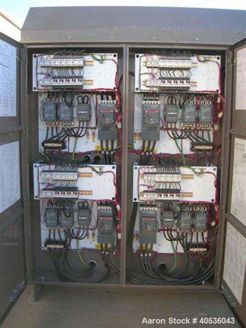 Unused-York 418 ton, model YCAS0418EB46YGADBT screw compressor, 430/3/60 volts. R-407C refrigerant, high efficiency, Black Fin condenser coils, louvered enclosure panels and many more options.