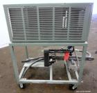Used Cold Shot Chiller, 2 Tons, Model ACWC-24-ERF. Air cooled, 1/208/230 Volts, 60 hertz. Freon: 2.5# R-22. Includes a 1hp pump. Mounted on a frame with casters.