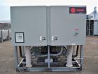 Used Trane 100 Nominal Ton Air Cooled Screw Chiller. Trane model RTAA1004YH01A3DOF. Designed for 460/3/60 volt operation. Year 1997.