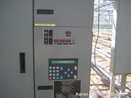 Used Dunham Busch, model WCFFX12BAS, 30 ton capacity glycol chiller. Uses R-22 refrigerant, skid mounted with 6 ft long x 4 ft wide x 6 ft high rectangular open top water storage tank.  Compressor ra...