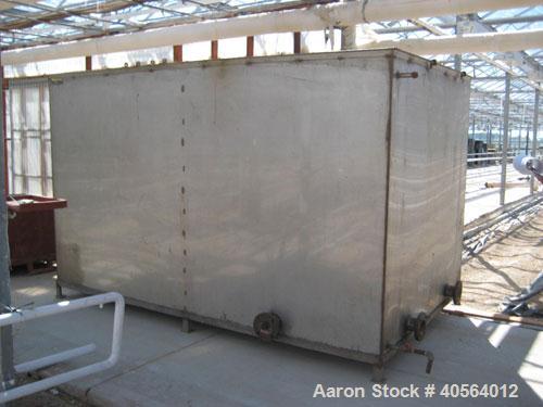 Used Dunham Busch, model WCFFX12BAS, 30 ton capacity glycol chiller. Uses R-22 refrigerant, skid mounted with 6 ft long x 4 ft wide x 6 ft high rectangular open top water storage tank.  Compressor ra...