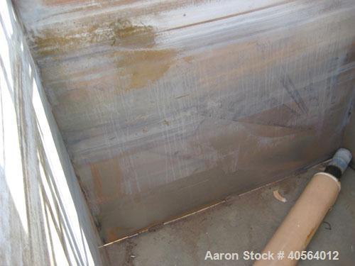 Used Dunham Busch, model WCFFX12BAS, 30 ton capacity glycol chiller. Uses R-22 refrigerant, skid mounted with 6 ft long x 4 ft wide x 6 ft high rectangular open top water storage tank.  Compressor ra...