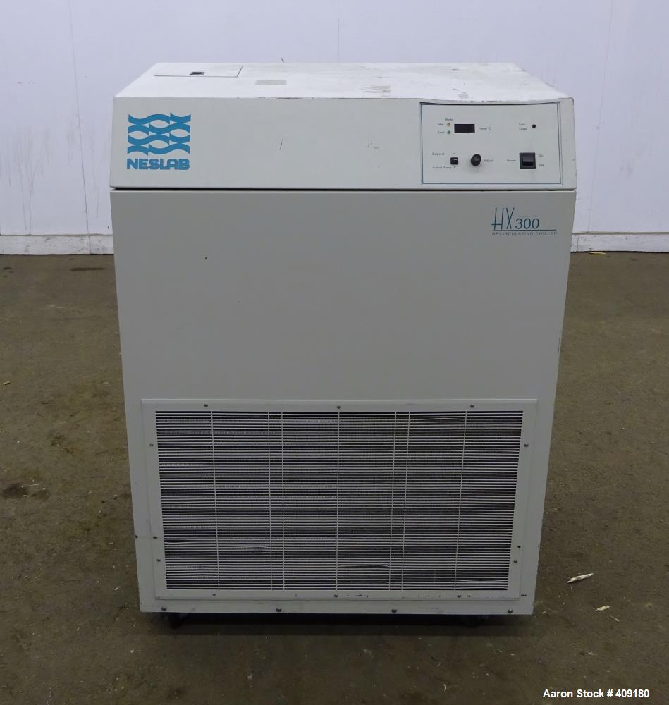 Used Neslab Refrigerated Recirculating Chiller, Model HX-300, Approximate 2 Ton (7.5kW) Cooling Capacity. Approximate 9 gallons per minute at 50 psi. Pressures low side: 150 psi, high side: 400 psi. ...