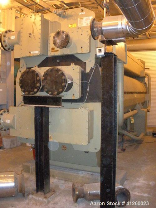 Used Trane Chiller, 700 Ton, Model ABSD700. Single stage steam fired absorption type. Max inlet 14 psig, 460V, 60 Hz, 3 Ph, .071 coefficiant.  Water flow rate 1766 gpm, pressure drop 22.3 ft wtr, con...