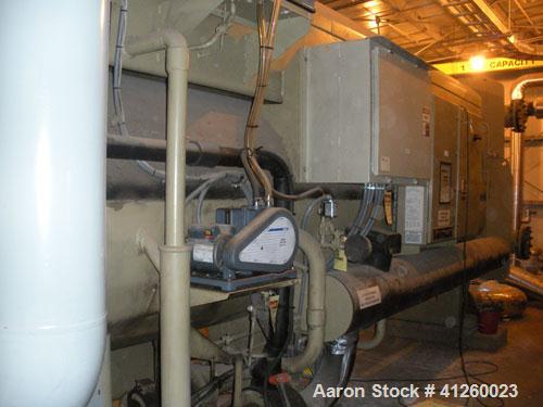 Used Trane Chiller, 700 Ton, Model ABSD700. Single stage steam fired absorption type. Max inlet 14 psig, 460V, 60 Hz, 3 Ph, .071 coefficiant.  Water flow rate 1766 gpm, pressure drop 22.3 ft wtr, con...