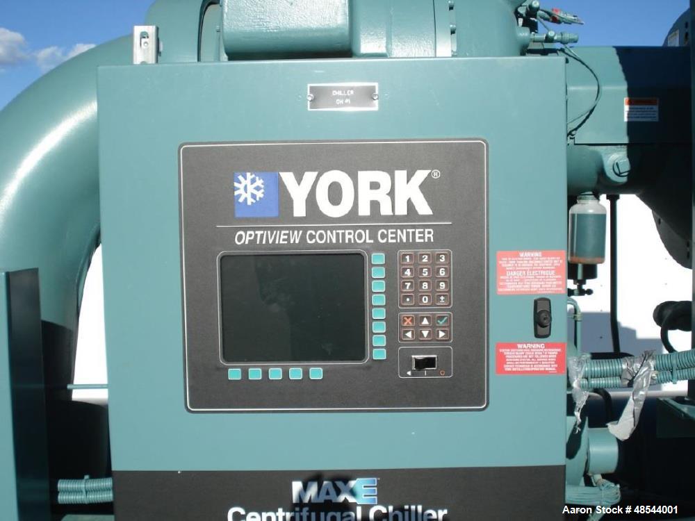 Used York YK MAXE Chiller, Model YKDSDSQ5, 350 Tons. Gear code WW. Refrigerant R-134A. Fluid type: water. Passes: 2. Evap. flow 840 gpm. Cond. flow 1,050 gpm. Evap. pressure drop: 15.3 ft. Cond. pres...