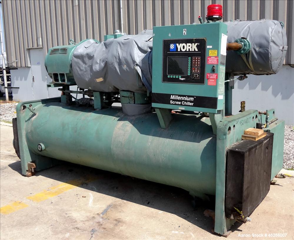 Used York Millennium Rotary Screw Liquid Chilling System, Approximate 350 Ton, Model YS-DB-DA-S2-CJE. Refirg. designed working pressure 300 psi, Liquid design working pressure 150 psi. 910 Pound char...