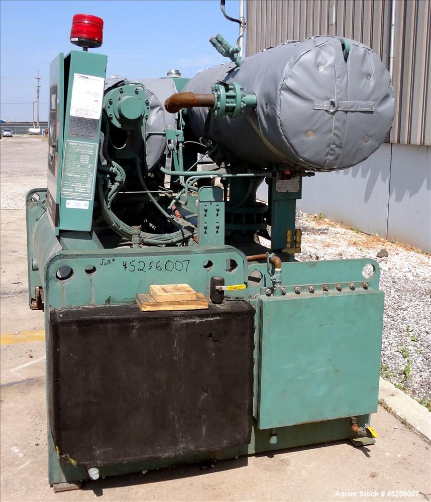Used York Millennium Rotary Screw Liquid Chilling System, Approximate 350 Ton, Model YS-DB-DA-S2-CJE. Refirg. designed working pressure 300 psi, Liquid design working pressure 150 psi. 910 Pound char...