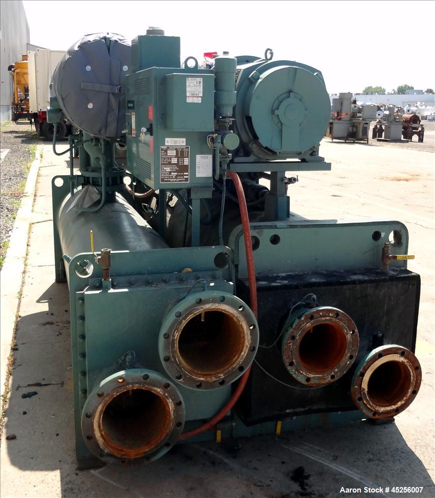 Used York Millennium Rotary Screw Liquid Chilling System, Approximate 350 Ton, Model YS-DB-DA-S2-CJE. Refirg. designed working pressure 300 psi, Liquid design working pressure 150 psi. 910 Pound char...
