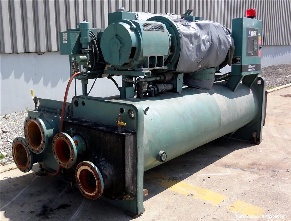 Used York Millennium Rotary Screw Liquid Chilling System, Approximate 350 Ton, Model YS-DB-DA-S2-CJE. Refirg. designed working pressure 300 psi, Liquid design working pressure 150 psi. 910 Pound char...