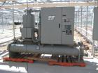 Used Dunham Busch, model WCFFX12BAS, 30 ton capacity glycol chiller. Uses R-22 refrigerant, skid mounted with 6 ft long x 4 ft wide x 6 ft high rectangular open top water storage tank.  Compressor ra...