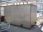 Used Dunham Busch, model WCFFX12BAS, 30 ton capacity glycol chiller. Uses R-22 refrigerant, skid mounted with 6 ft long x 4 ft wide x 6 ft high rectangular open top water storage tank.  Compressor ra...