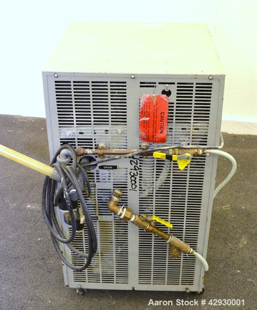 Used AEC Air Cooled Portable Chiller, Model PCA-150. Cooling capacity 1 ton, chilled water 4 gallons per minute. Minimum temperature 30 degrees F., maximum 65 degrees F. 3 pounds of R-22 refrigerant....