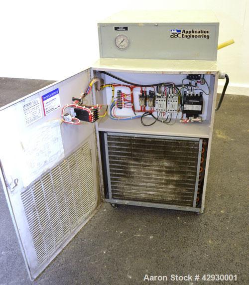 Used AEC Air Cooled Portable Chiller, Model PCA-150. Cooling capacity 1 ton, chilled water 4 gallons per minute. Minimum temperature 30 degrees F., maximum 65 degrees F. 3 pounds of R-22 refrigerant....