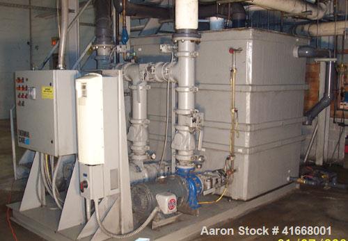 Used AEC Chiller, 1100 Gallons, Thermal Care (water cooled) with steel deck. Includes 80 ton and 100 ton cooling towers with stands, 10 ton (recep.); 50 ton scroll compressors; three fiberglass tank/...
