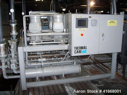 Used AEC Chiller, 1100 Gallons, Thermal Care (water cooled) with steel deck. Includes 80 ton and 100 ton cooling towers with stands, 10 ton (recep.); 50 ton scroll compressors; three fiberglass tank/...