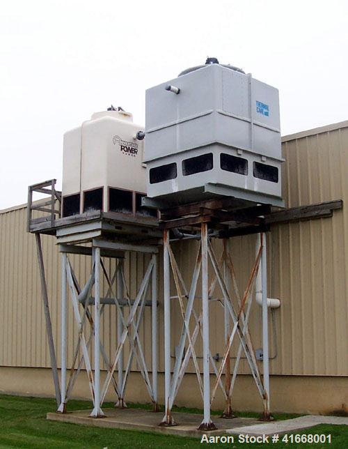 Used AEC Chiller, 1100 Gallons, Thermal Care (water cooled) with steel deck. Includes 80 ton and 100 ton cooling towers with stands, 10 ton (recep.); 50 ton scroll compressors; three fiberglass tank/...