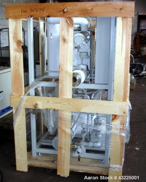 Unused- Budzar 15 Ton Water Cooled Chiller, Model LTW-15-FCB-70-S2S1. Nominally rated 70 gpm at 90' tdh. (2) Compressors, 5 hp circulation pump, condenser and plate heat exchanger, 65 gallon stainles...