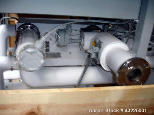 Unused- Budzar 15 Ton Water Cooled Chiller, Model LTW-15-FCB-70-S2S1. Nominally rated 70 gpm at 90' tdh. (2) Compressors, 5 hp circulation pump, condenser and plate heat exchanger, 65 gallon stainles...
