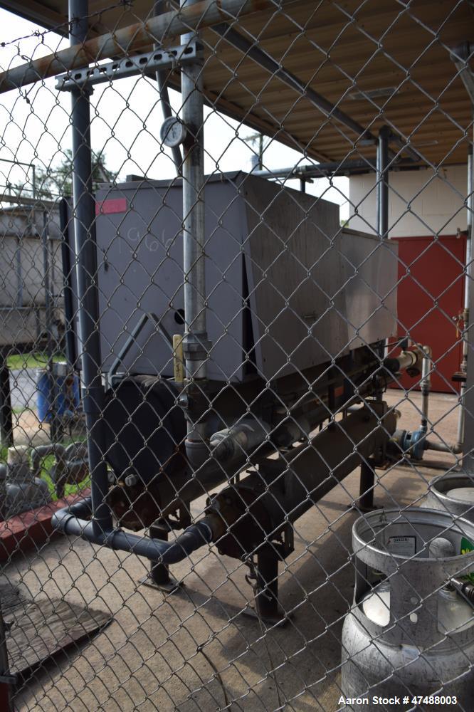 Used Carrier Reciprocating Liquid Chiller, Model 30HK-050-650. Nominal 50 Ton. Design pressure high side 385 psig, low side 235 psig. Designed for R22 refrigerant. 3/60/460 volt. Serial# 4995F81298. ...
