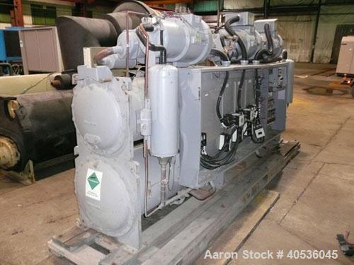 Unused-Slightly Damaged Carrier Model 30HXC246R--650--, Nominal 246 Ton, Water Cooled Screw Chiller. Designed for 460/3/60 volt operation and originally manufactured in 2003. The approximate unit dim...