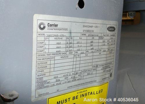 Unused-Slightly Damaged Carrier Model 30HXC246R--650--, Nominal 246 Ton, Water Cooled Screw Chiller. Designed for 460/3/60 volt operation and originally manufactured in 2003. The approximate unit dim...