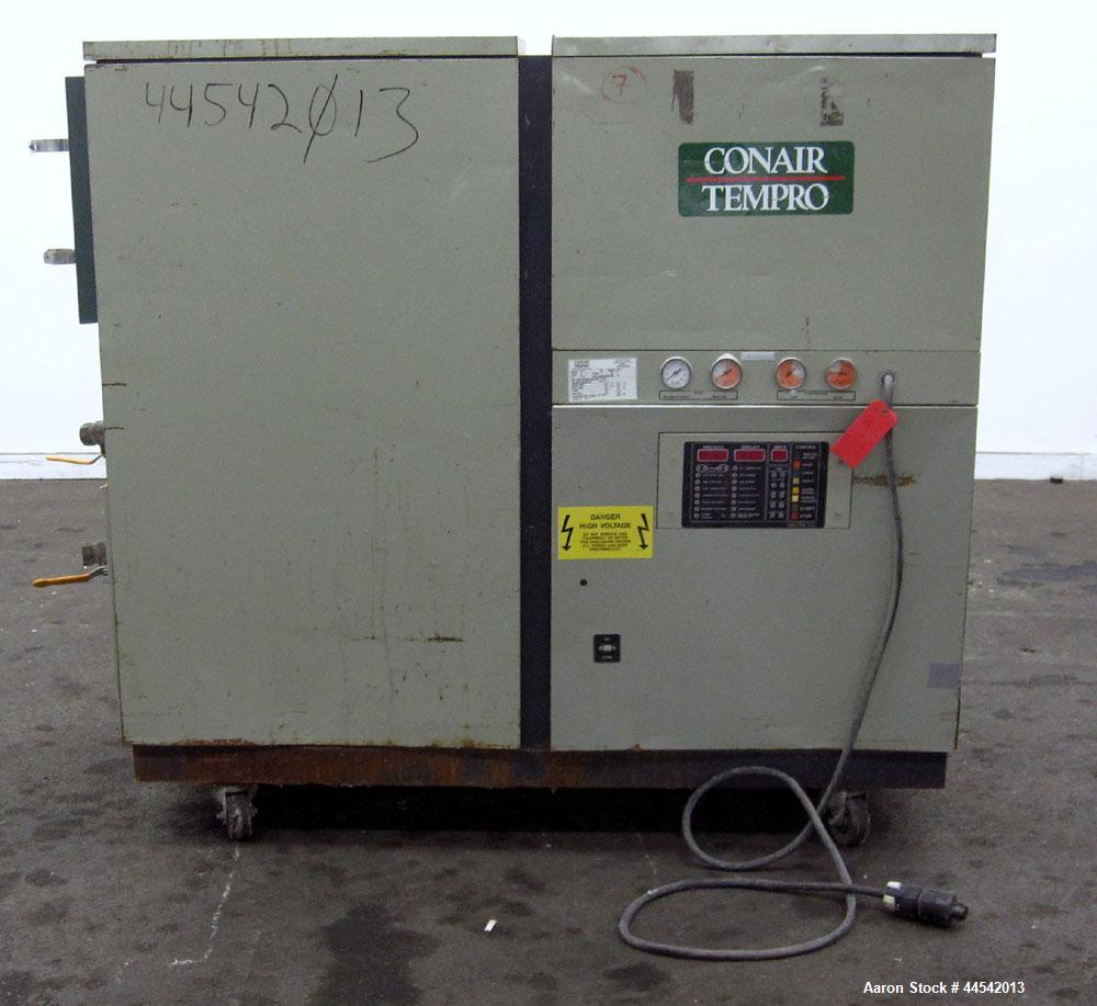 Used Conair Tempro Chiller, Model WC3-5, Approximately 5.8 tons. Water cooled. Temperature range 20 to 65 degrees F. Includes Micro Trac 3 control panel. Mounted on casters. 
.