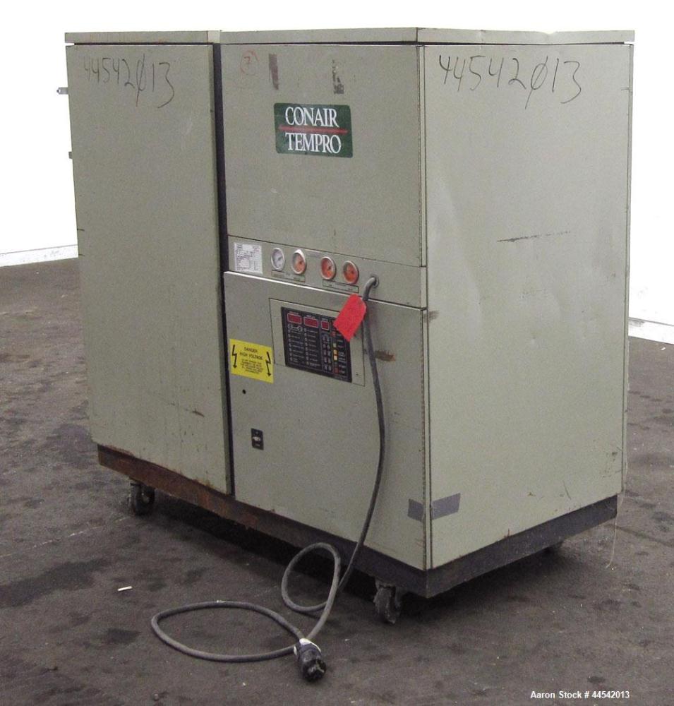 Used Conair Tempro Chiller, Model WC3-5, Approximately 5.8 tons. Water cooled. Temperature range 20 to 65 degrees F. Includes Micro Trac 3 control panel. Mounted on casters. 
.