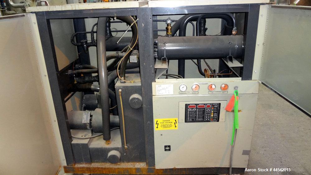 Used Conair Tempro Chiller, Model WC3-5, Approximately 5.8 tons. Water cooled. Temperature range 20 to 65 degrees F. Includes Micro Trac 3 control panel. Mounted on casters. 
.