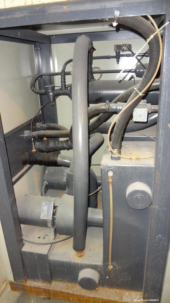 Used Conair Tempro Chiller, Model WC3-5, Approximately 5.8 tons. Water cooled. Temperature range 20 to 65 degrees F. Includes Micro Trac 3 control panel. Mounted on casters. 
.